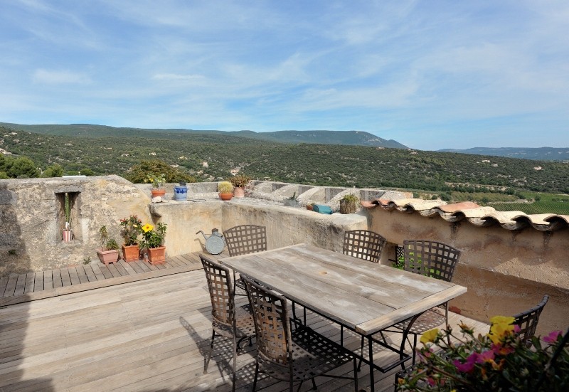 In a medieval village of the Luberon, for sale, a XIIth century property offering exceptional panoramic views
