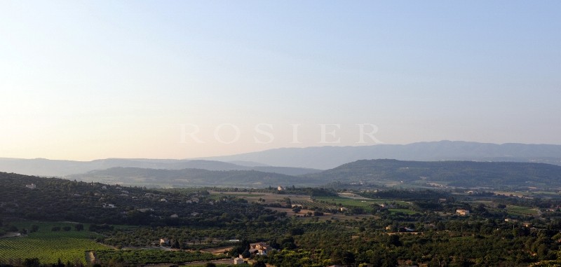 In a medieval village of the Luberon, for sale, a XIIth century property offering exceptional panoramic views