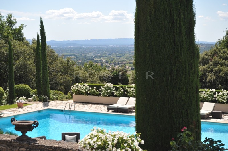 Luberon, for sale, up in the hills and just few minutes from a famous perched village, prestigious, contemporary-style property with amazing views.