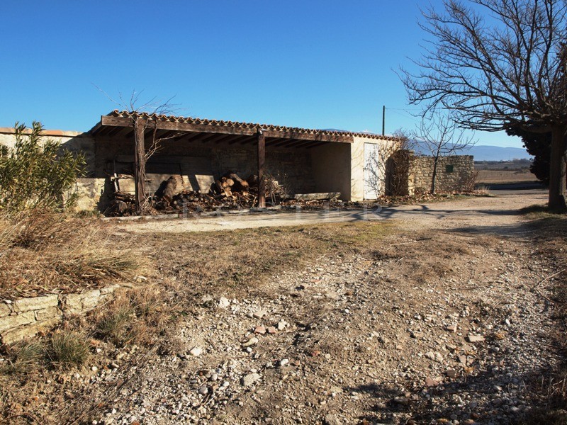 Former Provencal mill house with swimming pool for sale with views of the Ventoux mountain and surrounding villages.