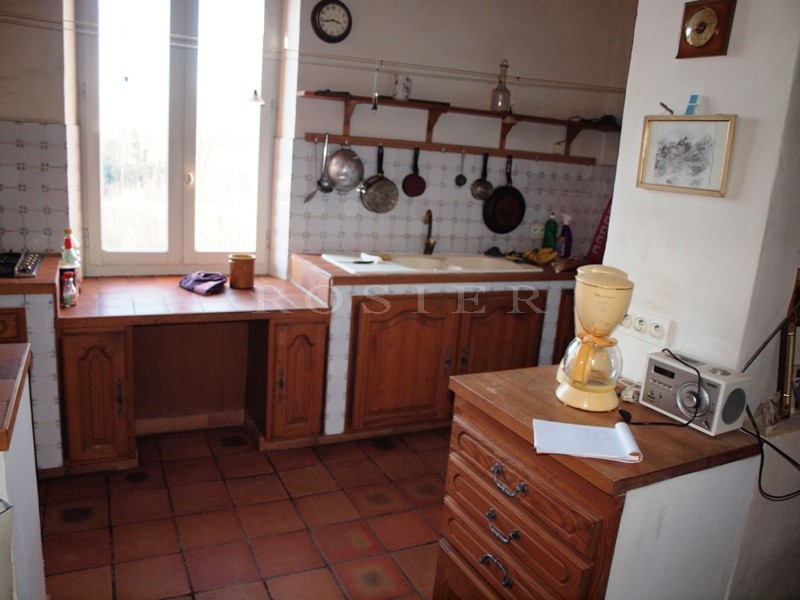 Former Provencal mill house with swimming pool for sale with views of the Ventoux mountain and surrounding villages.