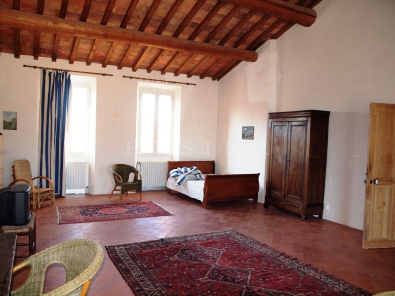 Former Provencal mill house with swimming pool for sale with views of the Ventoux mountain and surrounding villages.