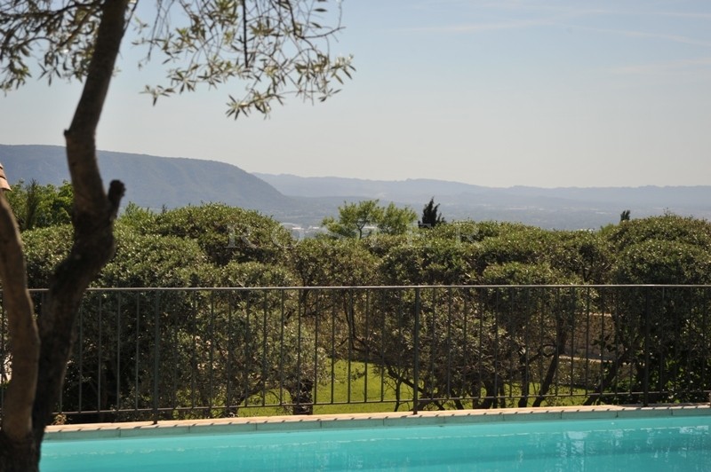 Gordes, for sale, a beautiful family farmhouse with outbuildings and a swimming pool offering breathtaking views over the Luberon, the Alpilles and surrounding countryside