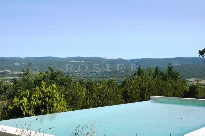Luberon, for sale, close to the classified village of Roussillon, beautiful stone house, entirely renovated, with large garden and swimming pool
