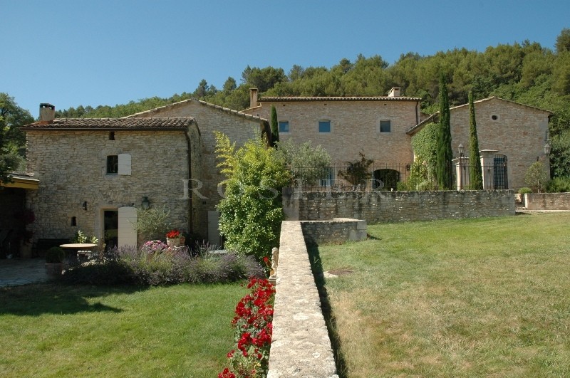 In Luberon, for sale, high end property, approximately 3 000 m²,  with 33 hectares with vineyards, wood, olive trees. 