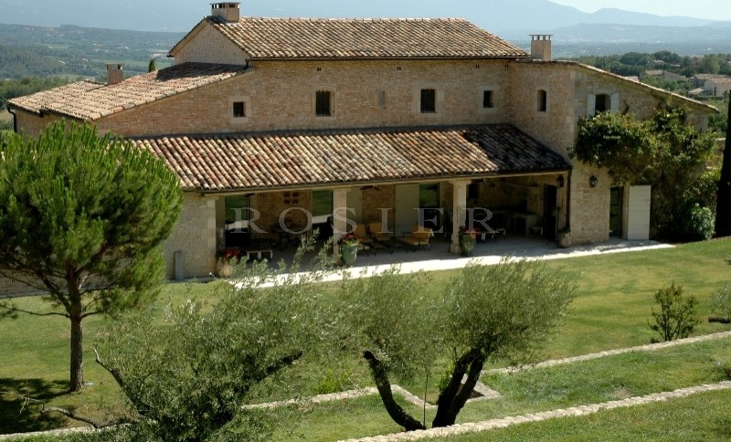 In Luberon, for sale, high end property, approximately 3 000 m²,  with 33 hectares with vineyards, wood, olive trees. 