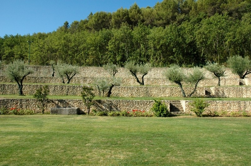 In Luberon, for sale, high end property, approximately 3 000 m²,  with 33 hectares with vineyards, wood, olive trees. 