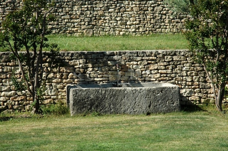 In Luberon, for sale, high end property, approximately 3 000 m²,  with 33 hectares with vineyards, wood, olive trees. 