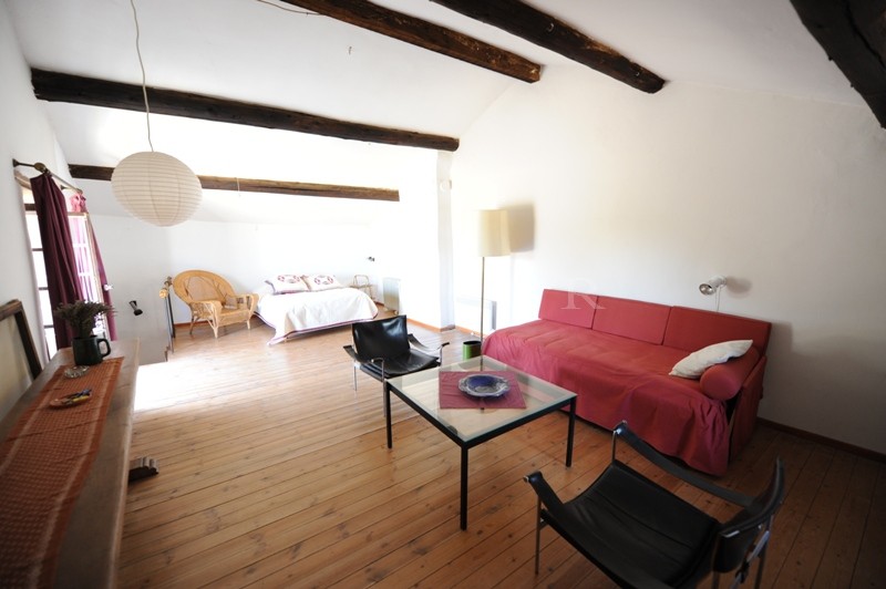 In the golden triangle of Luberon, for sale, an ancient farmhouse for renovation with an internal courtyard very close to the centre of a renowned Provencal village, with stunning views