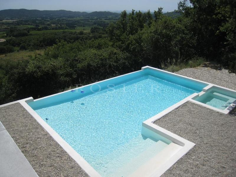 For sale, near Avignon, contemporary housewith infinity pool and terraces overlooking the valley