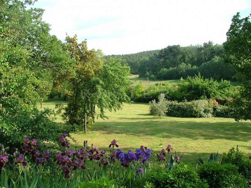 For sale, in the Luberon Regional Park, a restored farmhouse including three separate houses