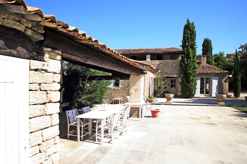 Gordes, for sale, house with a garden, terraces, swimming pool and pool house