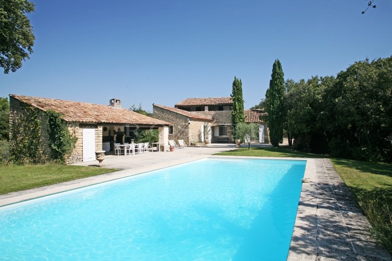 Gordes, for sale, house with a garden, terraces, swimming pool and pool house