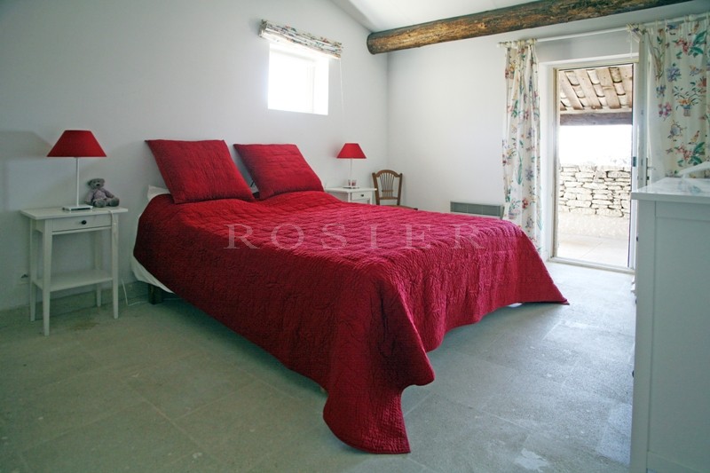 Gordes, for sale, house with a garden, terraces, swimming pool and pool house