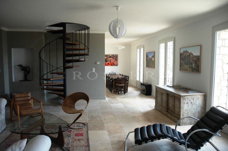 Luberon, for sale, close to the classified village of Roussillon, beautiful stone house, entirely renovated, with large garden and swimming pool