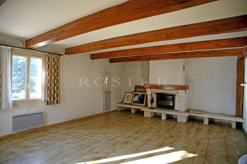 At the foot of the village of Gordes, stone house with a large garden