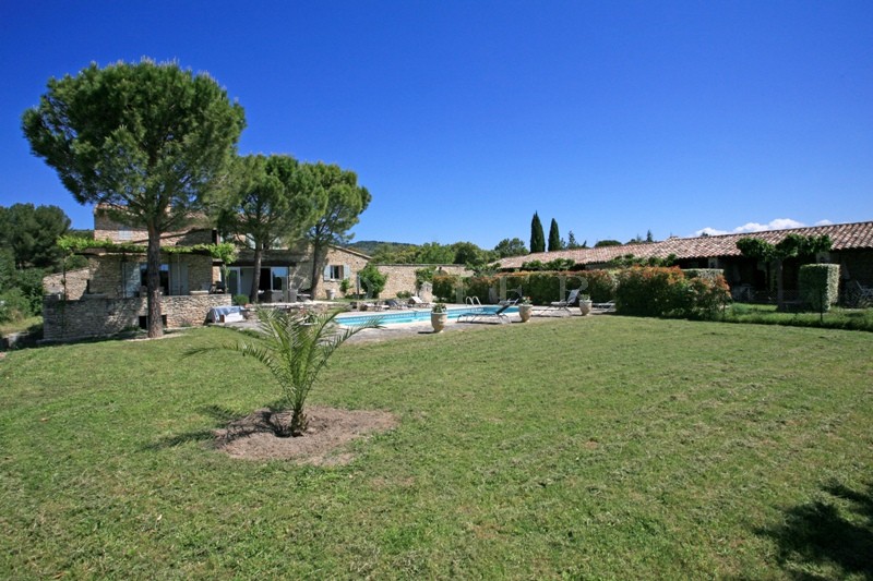 For sale in Luberon, large stone house with guest houses in Luberon with swimming pool, views and terraces. 