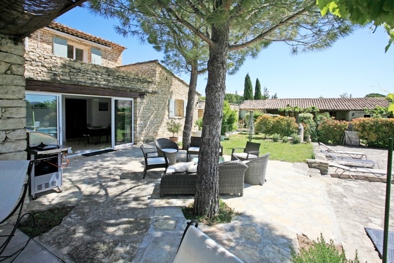 For sale in Luberon, large stone house with guest houses in Luberon with swimming pool, views and terraces. 