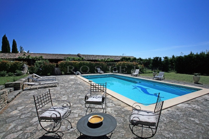 For sale in Luberon, large stone house with guest houses in Luberon with swimming pool, views and terraces. 