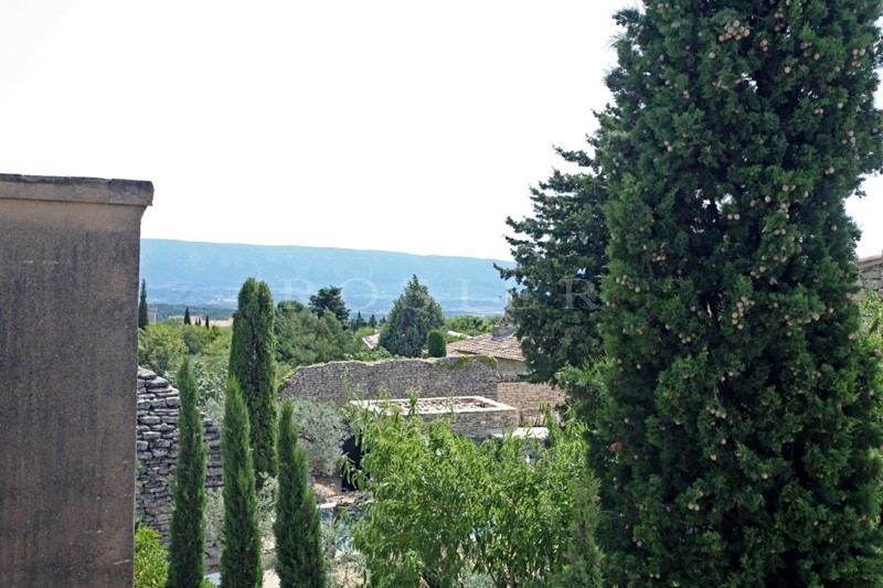 Gordes, for sale, lovely location for this stone house with sunny terrace on the Luberon and garden. 