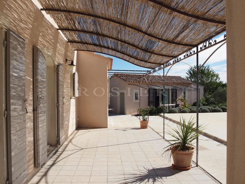 Near the hilltop village of Lacoste, for sale, contemporary of 6 main rooms, with a beautiful terraces, landscaped garden and heated swimming pool.