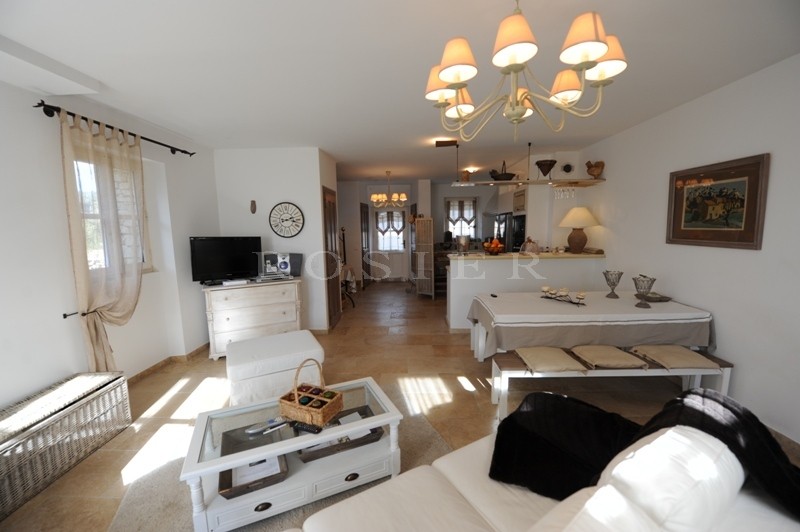 For sale in Gordes, in the village center, very charming stone built 2 storey house with swimming pool and garage
