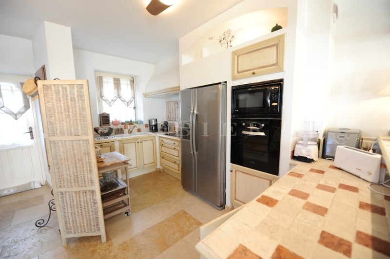 For sale in Gordes, in the village center, very charming stone built 2 storey house with swimming pool and garage