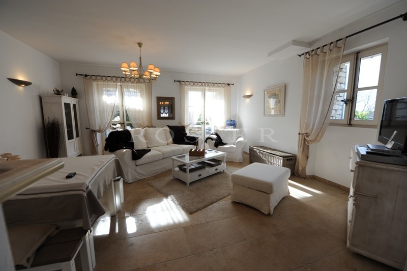 For sale in Gordes, in the village center, very charming stone built 2 storey house with swimming pool and garage