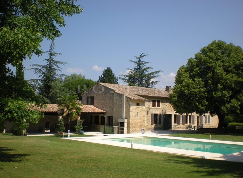 For sale in Luberon by ROSIER, authentic renovated provençal farmhouse with a large terrace, a swimming pool on a 7 900 m² park