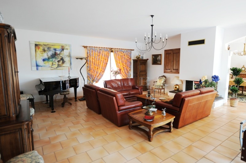 For sale, near Roussillon, contemporary house with infinity swimming pool in a scenery of ochre hills