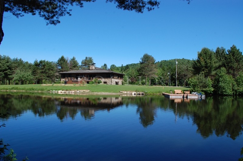 Canada, Laurentides, for sale real canadian chalet with a guest house and 2 lakes in a breathtaking scenery.