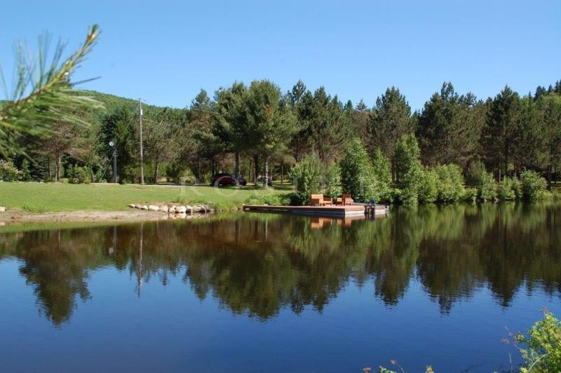 Canada, Laurentides, for sale real canadian chalet with a guest house and 2 lakes in a breathtaking scenery.