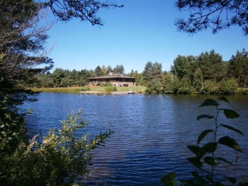 Canada, Laurentides, for sale real canadian chalet with a guest house and 2 lakes in a breathtaking scenery.