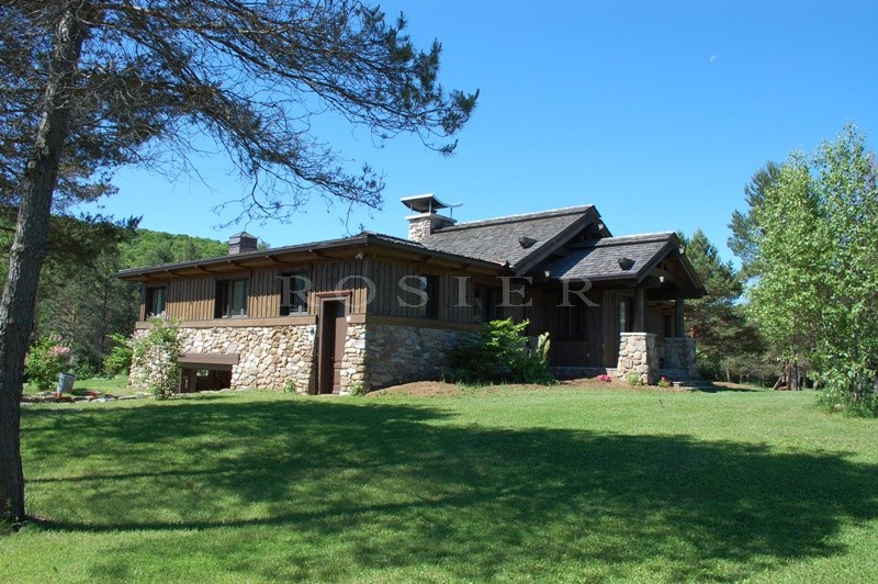 Canada, Laurentides, for sale real canadian chalet with a guest house and 2 lakes in a breathtaking scenery.