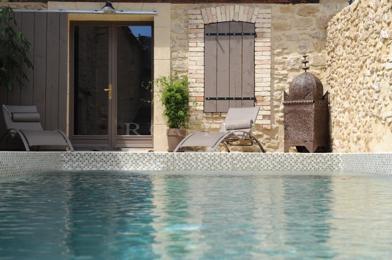 For sale, near Avignon, former factory entirely renovated, very contemporary with patio, fountain and swimming pool