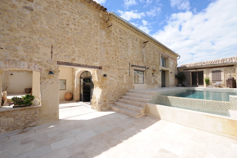 For sale, near Avignon, former factory entirely renovated, very contemporary with patio, fountain and swimming pool