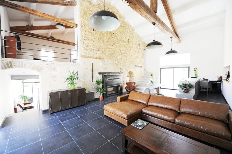 For sale, near Avignon, former factory entirely renovated, very contemporary with patio, fountain and swimming pool
