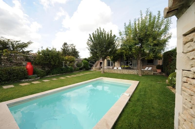For sale, near the perched villages of Luberon, stone house with garden and swimming pool