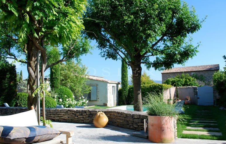 For sale, near the perched villages of Luberon, stone house with garden and swimming pool
