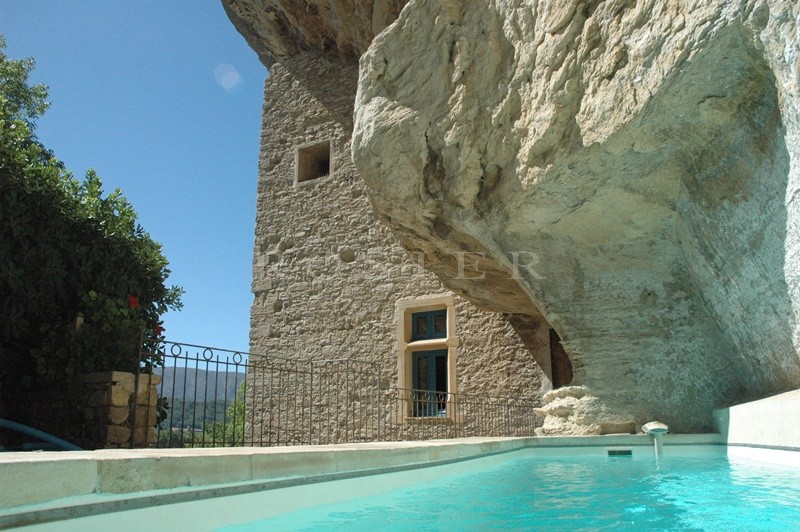 For sale, in Luberon, very original semi troglodyte house, with outbuildings, on 2 hectares with a lovely olive grove