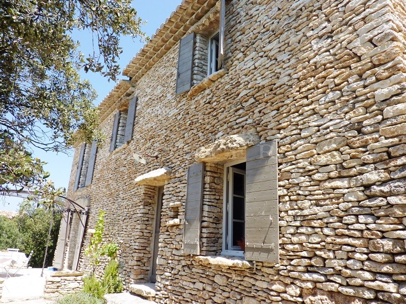 For sale in the Luberon, lovely hamlet house with guest house, garden and swimming pool