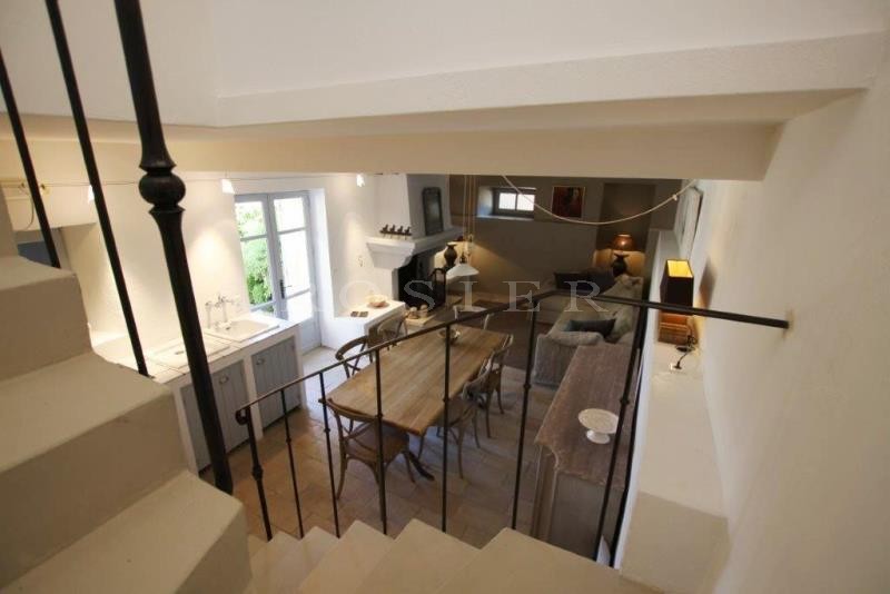 For sale, in Gordes, in a hamlet; beautiful old stone house, with terraces, garden and swimming pool