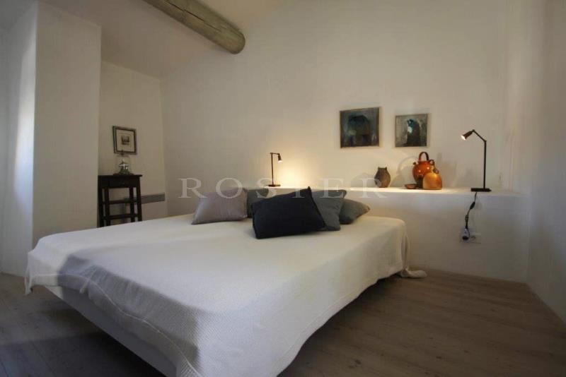 For sale, in Gordes, in a hamlet; beautiful old stone house, with terraces, garden and swimming pool