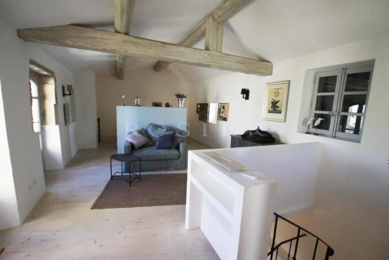 For sale, in Gordes, in a hamlet; beautiful old stone house, with terraces, garden and swimming pool