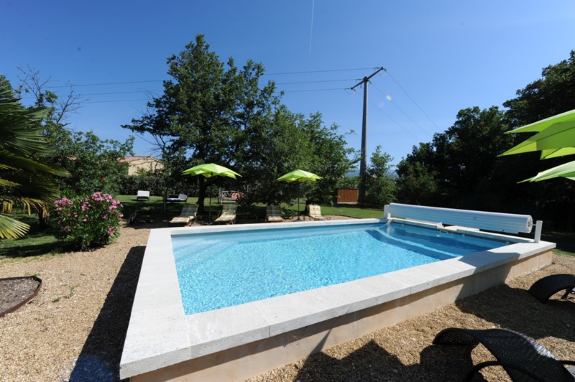 For sale, near a beautiful village, contemporary villa with large volumes, landscaped garden and swimming pool