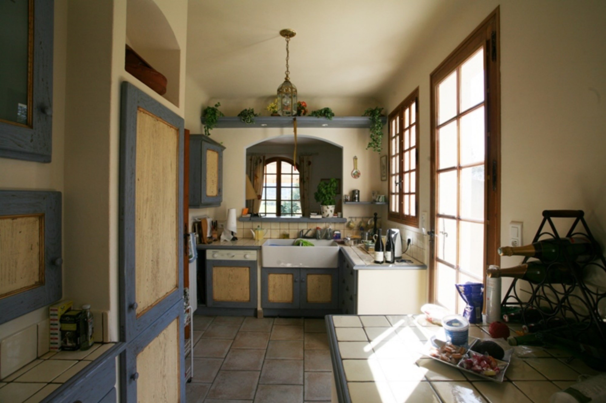 For sale, provencal property with pool and terrace overlooking a vineyard, countryside and facing the Luberon