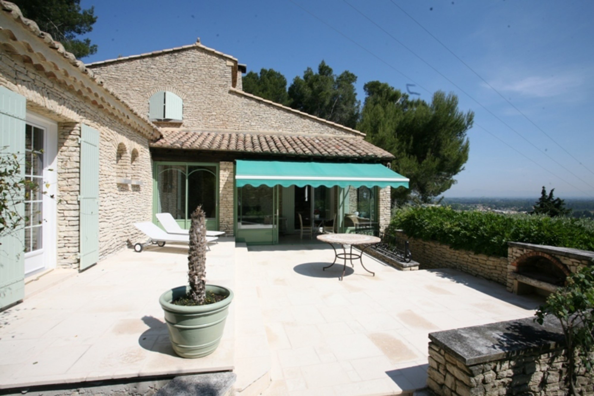 Comtat Venaissin, near Avignon, for sale, nice stone house, built on a high position overlooking the valley with garden and swimming pool