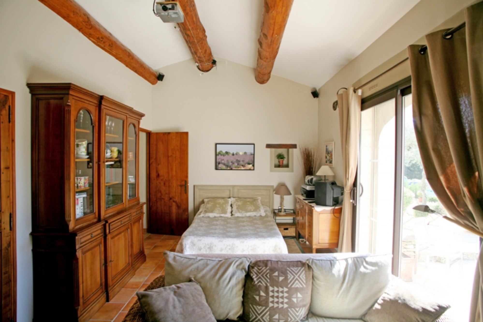 Near Gordes in Luberon, for sale, lovely house with terrace, garden, swimming pool, facing the Luberon offering stunning views