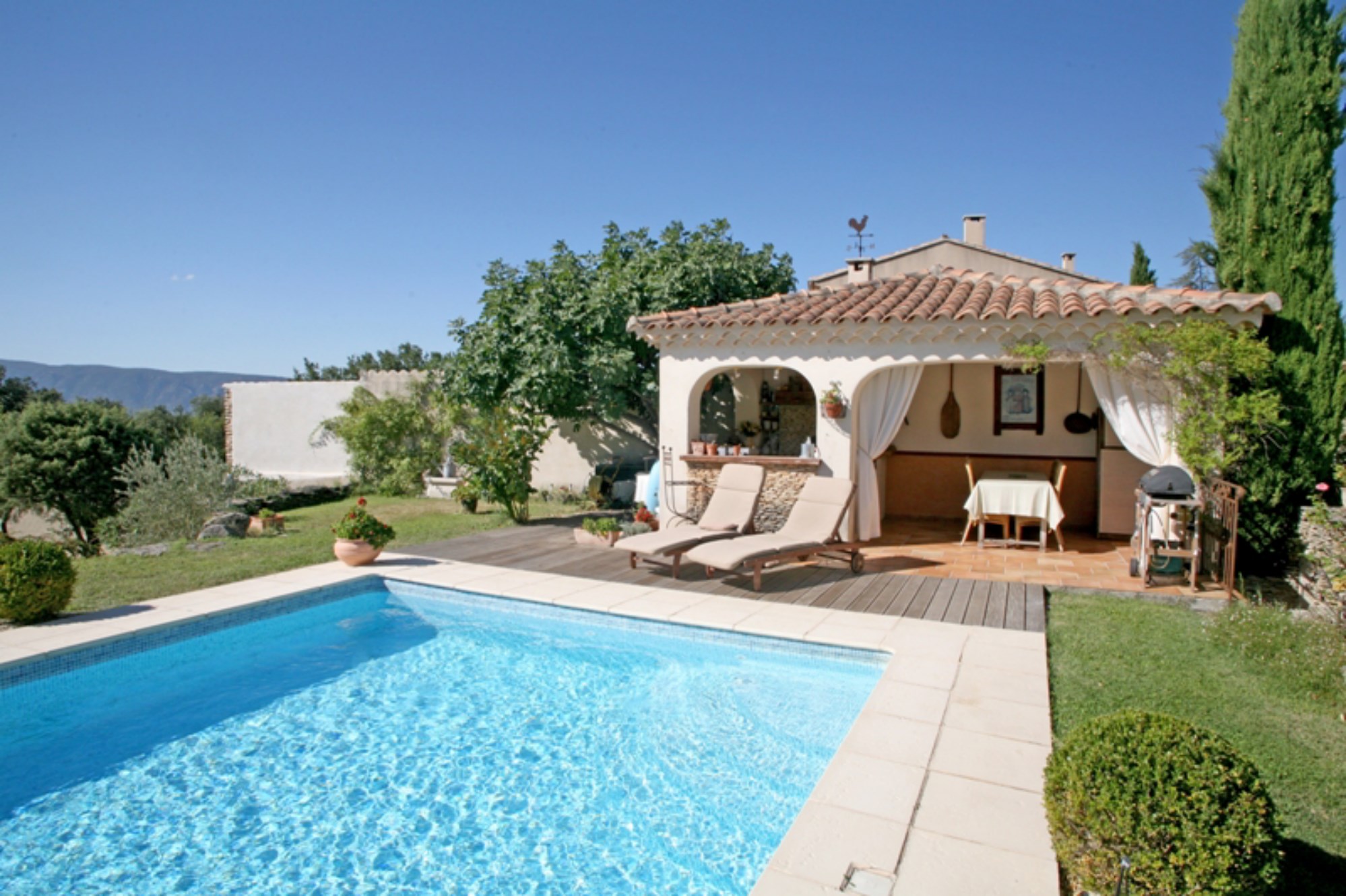Near Gordes in Luberon, for sale, lovely house with terrace, garden, swimming pool, facing the Luberon offering stunning views
