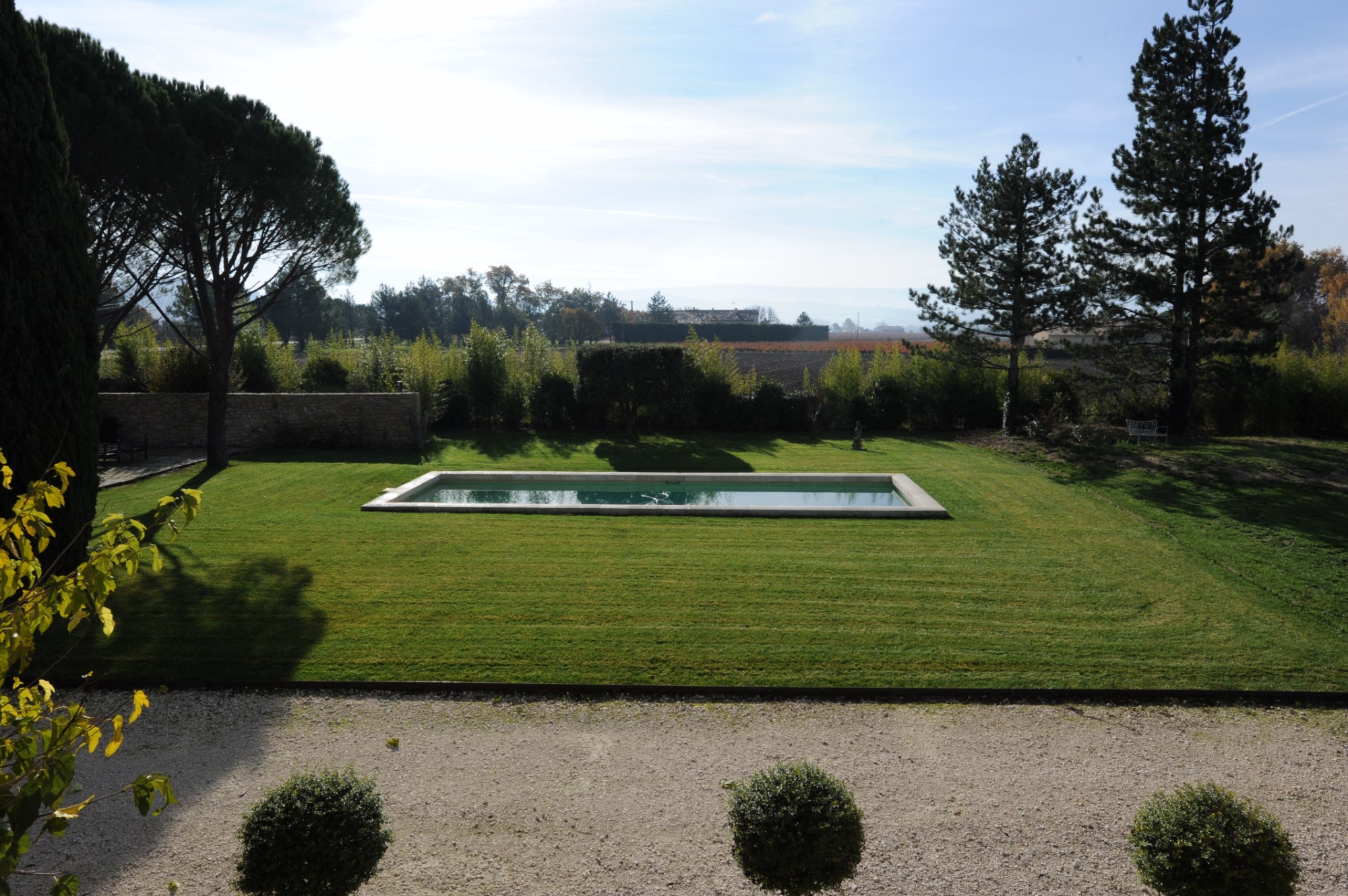 Between the Vaucluse mountains and the Luberon, for sale, a renovated south-facing stone farmhouse with woodlands 